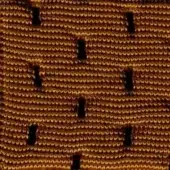 Woven fabric, golden-brown tone, rectangular cutouts, dense jacquard weave, “swan > fabric (super) > super 238” label, studio lighting.